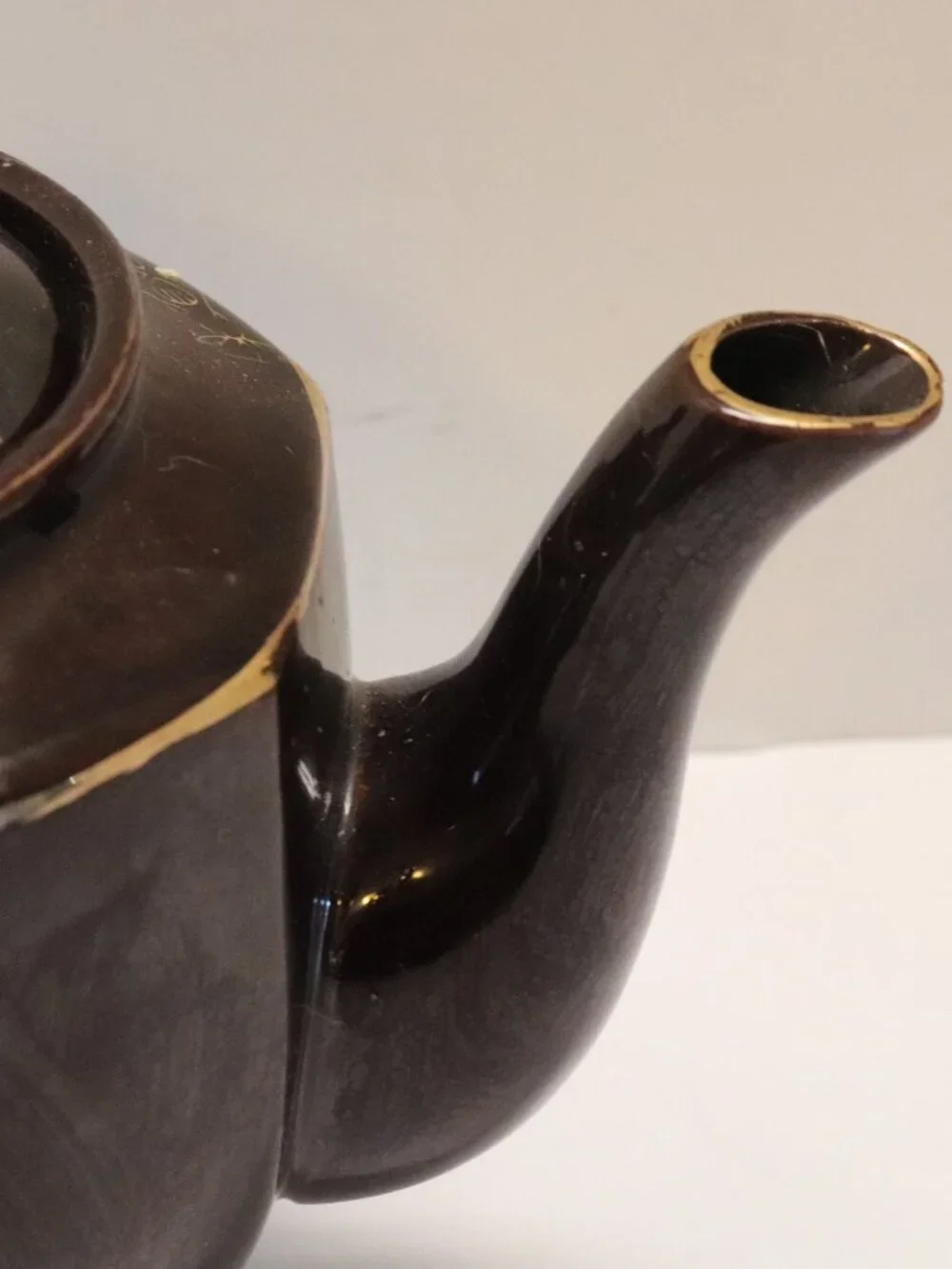 A Porcelain Pitcher made in Japan with Japan Written on Bottom Black